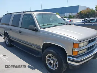 1999 Chevrolet Suburban z VIN 3GNFK16R7XG237811, wystawiony jako IAAI lot #42528010 z przebiegiem 207 438 mil mil oraz . Historia ofert i sprzedaży dostępna na DreamBid. Obrazek 1.