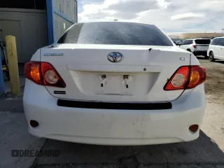 2010 Toyota Corolla with VIN 1NXBU4EE2AZ233411, listed as a Copart auction lot 50805895 with 128,632 mi miles and Salvage Title. Bid and sale history available at carsss.com. Image 6.