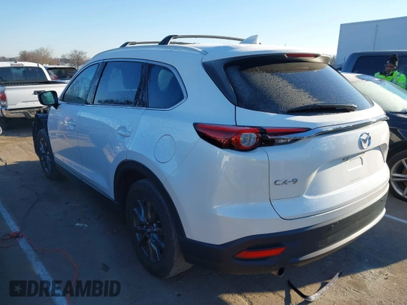 2021 Mazda CX-9 Touring with VIN JM3TCACY4M0522302, listed as a IAAI auction lot 41323543 with 35,223 mi miles and . Bid and sale history available at DreamBid. Image 3.