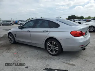 2015 BMW 4 Series 428i xDrive with VIN WBA4C9C55FD331210, listed as a Copart auction lot 54158235 with 88,372 mi miles and Salvage title. Bid and sale history available at DreamBid. Image 2.