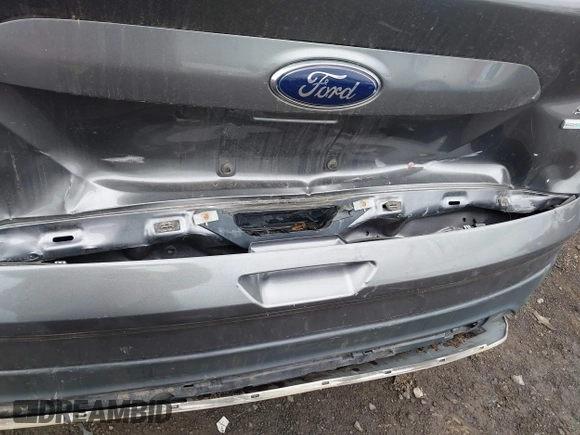 2013 Ford Escape SE with VIN 1FMCU9GX4DUB35629, listed as a IAAI auction lot 42446685 with 103,420 mi miles and . Bid and sale history available at DreamBid. Image 6.