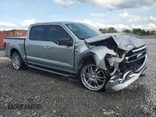 2023 Ford F-150 XL with VIN 1FTEW1C50PKF91124, listed as a Copart auction lot 51538865 with 22,128 mi miles and Salvage title. Bid and sale history available at DreamBid. Image 4.
