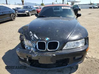 2000 BMW Z3 2.5 z VIN 4USCH9341YLF86451, wystawiony jako Copart lot #49142145 z przebiegiem 229 846 mil mil oraz Szkoda całkowita • Salvage title. Historia ofert i sprzedaży dostępna na DreamBid. Obrazek 5.