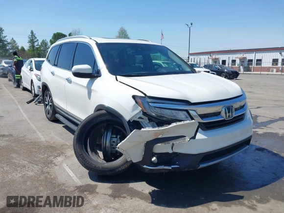 2019 Honda Pilot Touring 8-Passenger z VIN 5FNYF5H93KB021978, wystawiony jako IAAI lot #41915333 z przebiegiem 82 676 mil mil oraz . Historia ofert i sprzedaży dostępna na DreamBid. Obrazek 6.