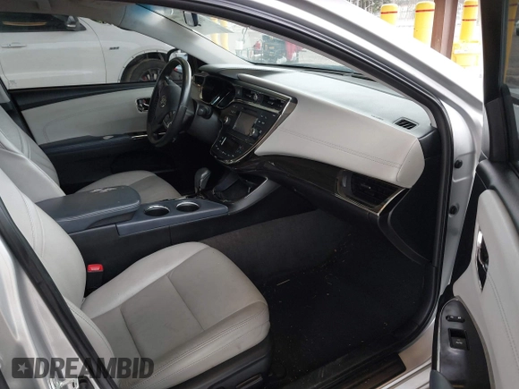 2014 Toyota Avalon Limited with VIN 4T1BK1EB3EU104576, listed as a IAAI auction lot 41773431 with 105,419 mi miles. Bid and sale history available at carsss.com. Image 5.