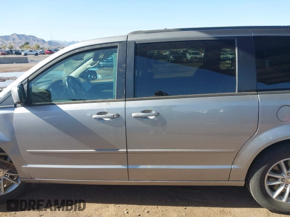 2015 Dodge Grand Caravan SXT with VIN 2C4RDGCG1FR649074, listed as a IAAI auction lot 41759409 with 116,856 mi miles and . Bid and sale history available at DreamBid. Image 15.