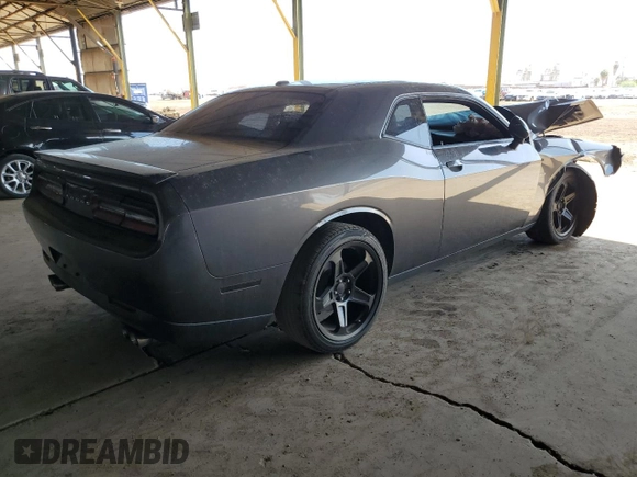 2015 Dodge Challenger R/T with VIN 2C3CDZAT1FH865454, listed as a Copart auction lot 53930725 with 104,481 mi miles and Salvage title. Bid and sale history available at DreamBid. Image 3.