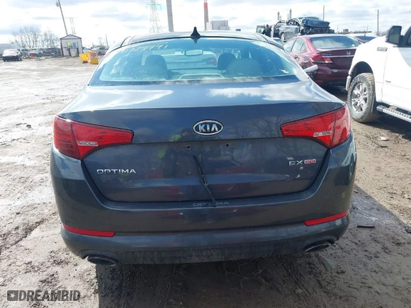 2011 Kia Optima EX with VIN KNAGN4A75B5156895, listed as a IAAI auction lot 41729991 with 151,348 mi miles. Bid and sale history available at carsss.com. Image 16.