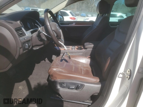 2012 Volkswagen Touareg Sport z VIN WVGFK9BP5CD000233, wystawiony jako Copart lot #46517515 z przebiegiem 198 242 mil mil oraz Szkoda całkowita • Salvage title. Historia ofert i sprzedaży dostępna na DreamBid. Obrazek 7.