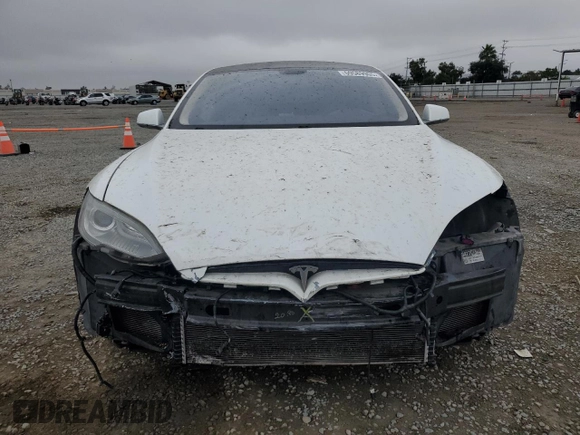 2014 Tesla Model S 60 с VIN 5YJSA1H19EFP52457, выставлен на аукционе Copart как лот 59589905 с пробегом 167 662 миль миль и Списание • Salvage title. История ставок и продаж доступна на DreamBid. Изображение 5.