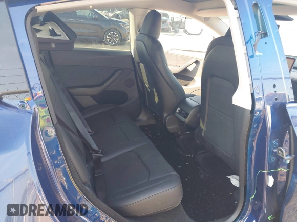 2023 Tesla Model Y Long Range with VIN 7SAYGDEE3PA114256, listed as a IAAI auction lot 42158307 with 19,975 mi miles and . Bid and sale history available at DreamBid. Image 8.