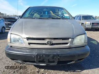 1999 Toyota Sienna LE with VIN 4T3ZF13CXXU121819, listed as a IAAI auction lot 41607624 with 999,999 mi miles. Bid and sale history available at carsss.com. Image 6.