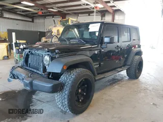 2012 Jeep Wrangler Unlimited Sport with VIN 1C4BJWDG8CL246829, listed as a IAAI auction lot 41816197 with 198,502 mi miles. Bid and sale history available at carsss.com. Image 20.