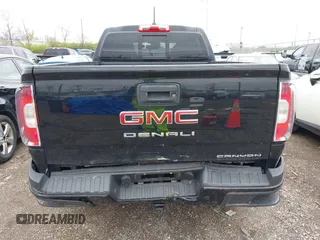 2021 GMC Canyon 4WD Denali with VIN 1GTG6EEN6M1260580, listed as a IAAI auction lot 41918693 with 52,085 mi miles. Bid and sale history available at carsss.com. Image 6.