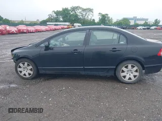 2008 Honda Civic LX z VIN 2HGFA16528H339593, wystawiony jako IAAI lot #42253517 z przebiegiem 130 465 mil mil oraz . Historia ofert i sprzedaży dostępna na DreamBid. Obrazek 14.