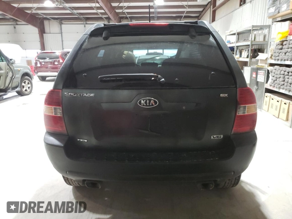 2005 Kia Sportage LX with VIN KNDJE723857118317, listed as a Copart auction lot 80383494 with 91,084 mi miles and Salvage Title. Bid and sale history available at carsss.com. Image 6.