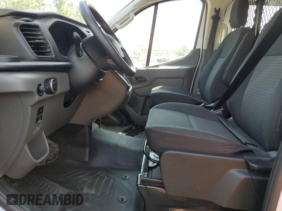 2023 Ford Transit Cargo with VIN 1FTBR1Y84PKA66581, listed as a Copart auction lot 62182335 with 19,897 mi miles and Clean title. Bid and sale history available at DreamBid. Image 7.