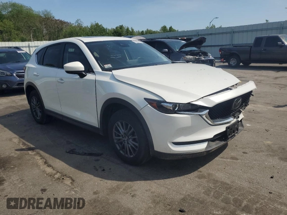 2021 Mazda CX-5 Touring with VIN JM3KFBCM7M0386995, listed as a Copart auction lot 55255784 with 43,561 mi miles and Salvage Title. Bid and sale history available at carsss.com. Image 4.