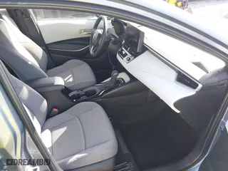 2024 Toyota Corolla Hybrid LE with VIN JTDBCMFE7RJ023311, listed as a IAAI auction lot 42051893 with 18,607 mi miles. Bid and sale history available at carsss.com. Image 5.