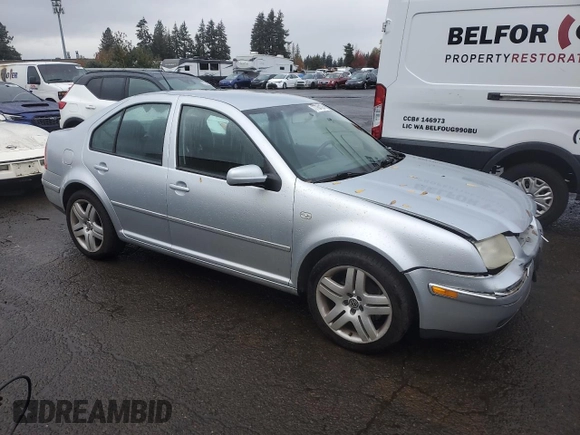 2004 Volkswagen Jetta GL z VIN 3VWRK69M54M030184, wystawiony jako Copart lot #77764124 z przebiegiem 97 634 mil mil oraz Szkoda całkowita • Salvage title. Historia ofert i sprzedaży dostępna na DreamBid. Obrazek 4.
