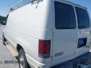 2009 Ford Econoline Cargo with VIN 1FTNE24W99DA45347, listed as a IAAI auction lot 42068121 with 301,292 mi miles. Bid and sale history available at carsss.com. Image 3.