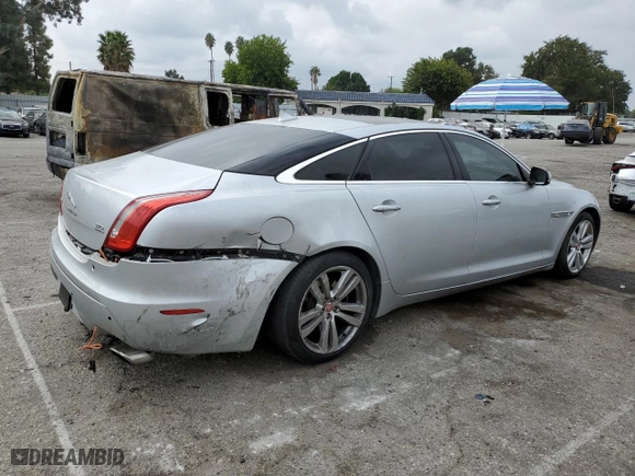 2014 Jaguar XJ with VIN SAJWJ2GD2E8V62696, listed as a Copart auction lot 76620494 with 85,487 mi miles and Salvage Title. Bid and sale history available at carsss.com. Image 3.