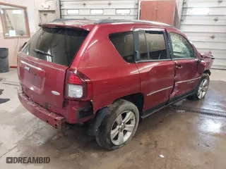 2014 Jeep Compass Latitude with VIN 1C4NJCEB2ED502667, listed as a IAAI auction lot 41628463 with 129,790 mi miles. Bid and sale history available at carsss.com. Image 4.