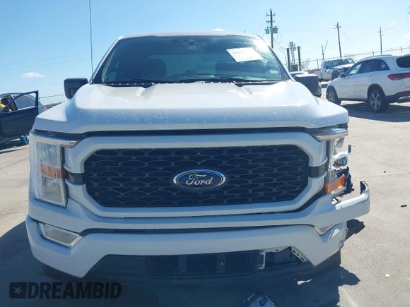 2021 Ford F-150 XL with VIN 1FTEW1CP2MFA09742, listed as a IAAI auction lot 41675603 with 94,983 mi miles. Bid and sale history available at carsss.com. Image 13.