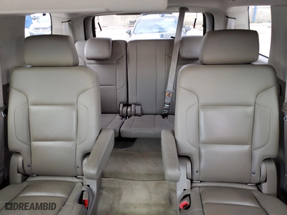 2015 Chevrolet Tahoe LTZ with VIN 1GNSKCKC4FR207496, listed as a Copart auction lot 86508634 with 220,629 mi miles and Salvage Title. Bid and sale history available at carsss.com. Image 10.