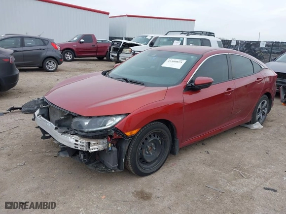 2021 Honda Civic Sedan LX with VIN 2HGFC2F63MH556959, listed as a IAAI auction lot 41580825 with 58,995 mi miles. Bid and sale history available at carsss.com. Image 2.