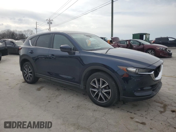 2018 Mazda CX-5 Touring with VIN JM3KFBCM5J0443383, listed as a Copart auction lot 47799095 with 39,814 mi miles and Salvage Title. Bid and sale history available at DreamBid. Image 4.