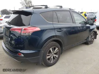 2018 Toyota RAV4 XLE with VIN JTMRFREV6JJ248098, listed as a IAAI auction lot 42042239 with 74,765 mi miles. Bid and sale history available at carsss.com. Image 4.