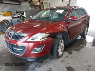 2012 Mazda CX-9 Grand Touring with VIN JM3TB3DVXC0343196, listed as a IAAI auction lot 42483753 with 88,157 mi miles and . Bid and sale history available at DreamBid. Image 2.