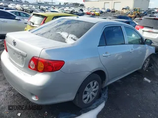2009 Toyota Corolla with VIN JTDBL40E899083155, listed as a IAAI auction lot 41056942 with 294,132 mi miles. Bid and sale history available at carsss.com. Image 4.