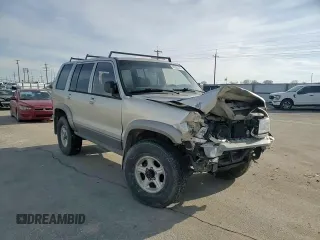 2001 Isuzu Trooper S with VIN JACDJ58X117J11550, listed as a Copart auction lot 46323185 with 236,762 mi miles and Salvage title. Bid and sale history available at DreamBid. Image 12.