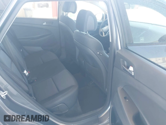 2017 Hyundai Tucson SE with VIN KM8J33A4XHU438510, listed as a IAAI auction lot 42021812 with 117,848 mi miles. Bid and sale history available at carsss.com. Image 8.