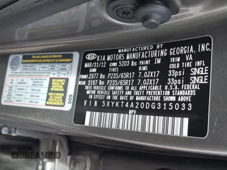 2013 Kia Sorento LX with VIN 5XYKT4A20DG315033, listed as a IAAI auction lot 41702643 with 123,011 mi miles. Bid and sale history available at carsss.com. Image 9.