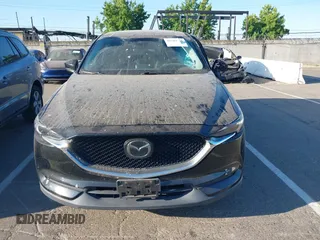 2018 Mazda CX-5 Grand Touring with VIN JM3KFBDM1J0345014, listed as a IAAI auction lot 42703926 with 151,453 mi miles and . Bid and sale history available at DreamBid. Image 12.