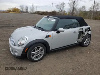 2012 MINI Convertible with VIN WMWZN3C57CT135185, listed as a Copart auction lot 78580644 with 83,027 mi miles and Salvage Title. Bid and sale history available at DreamBid. Image 1.