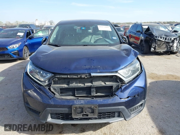 2019 Honda CR-V LX with VIN 5J6RW5H32KL003561, listed as a IAAI auction lot 41872089 with 65,146 mi miles and . Bid and sale history available at carsss.com. Image 12.