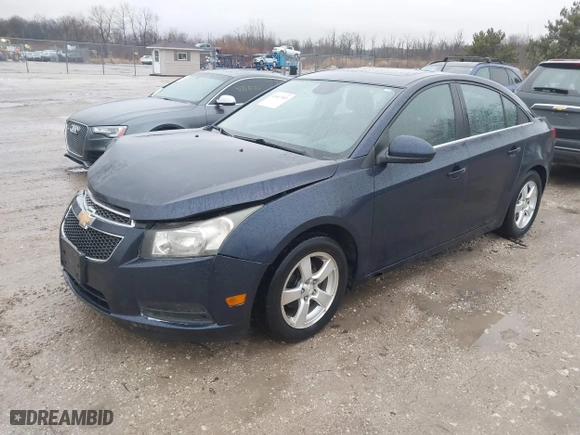 2011 Chevrolet Cruze LT w/2LT with VIN 1G1PG5S97B7160785, listed as a IAAI auction lot 41813953 with 137,282 mi miles. Bid and sale history available at carsss.com. Image 2.