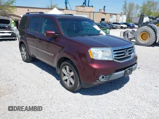 2012 Honda Pilot Touring with VIN 5FNYF4H90CB020623, listed as a IAAI auction lot 42048740 with 162,504 mi miles. Bid and sale history available at carsss.com. Image 1.