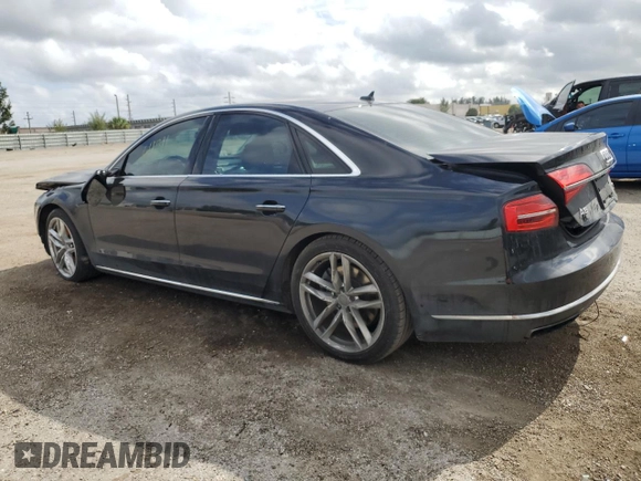 2015 Audi A8 4.0T with VIN WAUJ2AFD5FN013267, listed as a Copart auction lot 39065654 with 64,541 mi miles and . Bid and sale history available at DreamBid. Image 2.