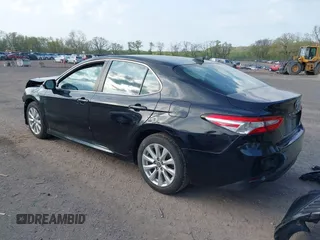2020 Toyota Camry LE with VIN 4T1C11AK2LU393699, listed as a IAAI auction lot 42123267 with 66,932 mi miles and . Bid and sale history available at carsss.com. Image 3.