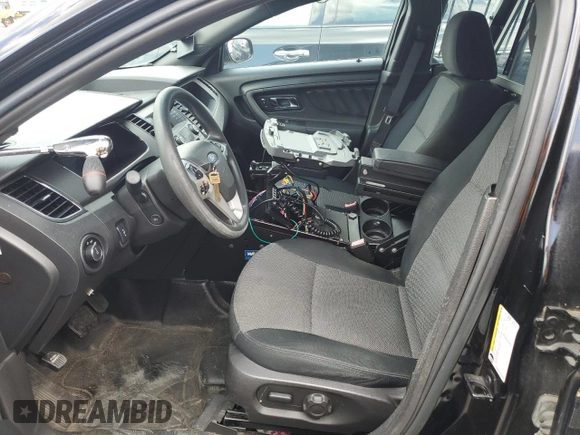 2014 Ford Police Interceptor with VIN 1FAHP2L82EG105333, listed as a Copart auction lot 66361525 with 101,176 mi miles and Clean title. Bid and sale history available at DreamBid. Image 7.