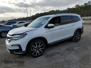 2021 Honda Pilot Touring 8-Passenger with VIN 5FNYF5H92MB001840, listed as a Copart auction lot 43236895 with 63,402 mi miles and Salvage Title. Bid and sale history available at DreamBid. Image 1.