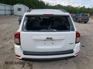 2015 Jeep Compass Latitude with VIN 1C4NJCEB9FD264284, listed as a Copart auction lot 76277334 with 104,275 mi miles and Salvage Title. Bid and sale history available at carsss.com. Image 6.