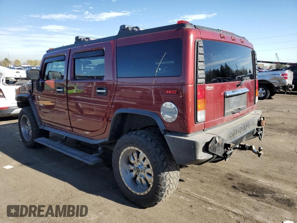 2003 Hummer H2 with VIN 5GRGN23U93H149294, listed as a Copart auction lot 80242304 with 199,675 mi miles and Salvage Title. Bid and sale history available at carsss.com. Image 2.