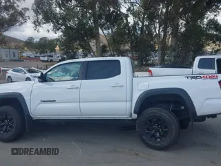 2019 Toyota Tacoma SR z VIN 3TMCZ5AN5KM249582, wystawiony jako IAAI lot #41925752 z przebiegiem 108 417 mil mil oraz . Historia ofert i sprzedaży dostępna na DreamBid. Obrazek 15.