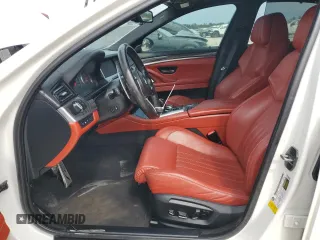 2016 BMW M5 with VIN WBSFV9C59GD595692, listed as a Copart auction lot 74151434 with 55,092 mi miles and Salvage Title. Bid and sale history available at carsss.com. Image 7.